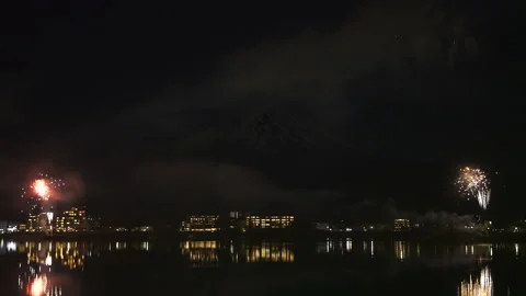 Spectacular fireworks display exploding over Lake Kawaguchiko Japan Stock Footage 339654498