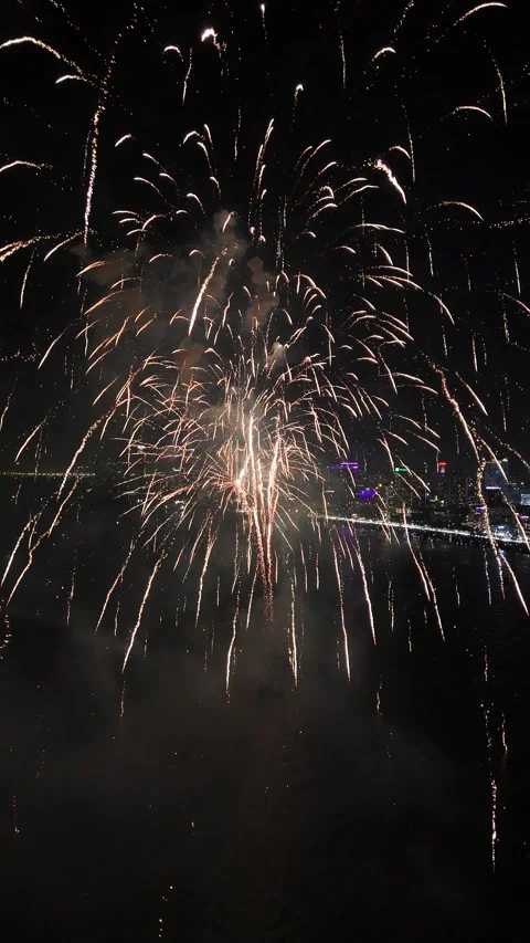 Spectacular Fireworks Exploding in Night Sky Over Pattaya, Thailand Stock Footage 335844008