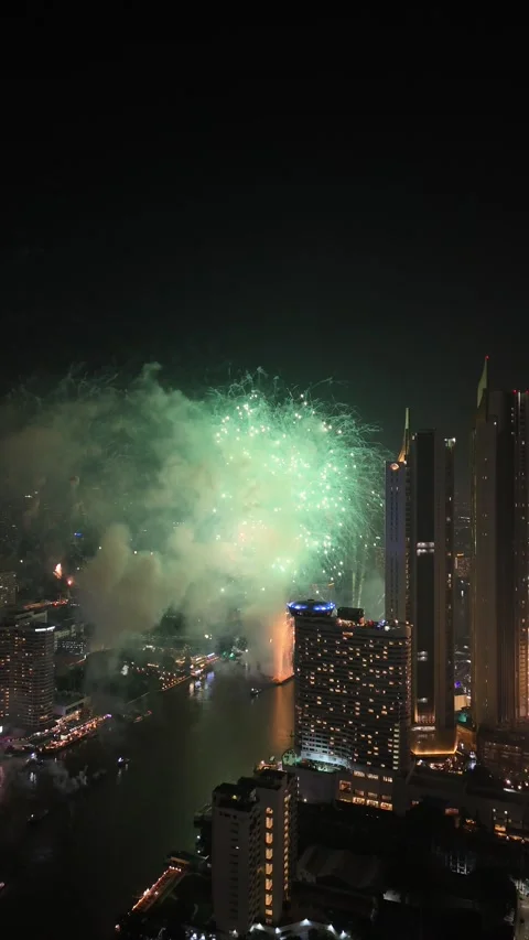 Spectacular Fireworks Exploding Over Bangkok, Thailand's Chao Phraya River Stock Footage 335974801