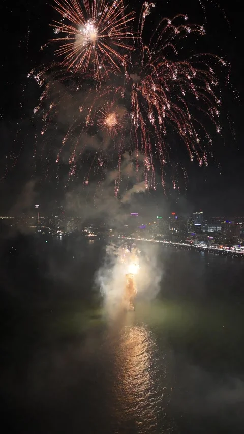 Spectacular Fireworks Exploding Over Pattaya, Thailand at Night Stock Footage 335844088