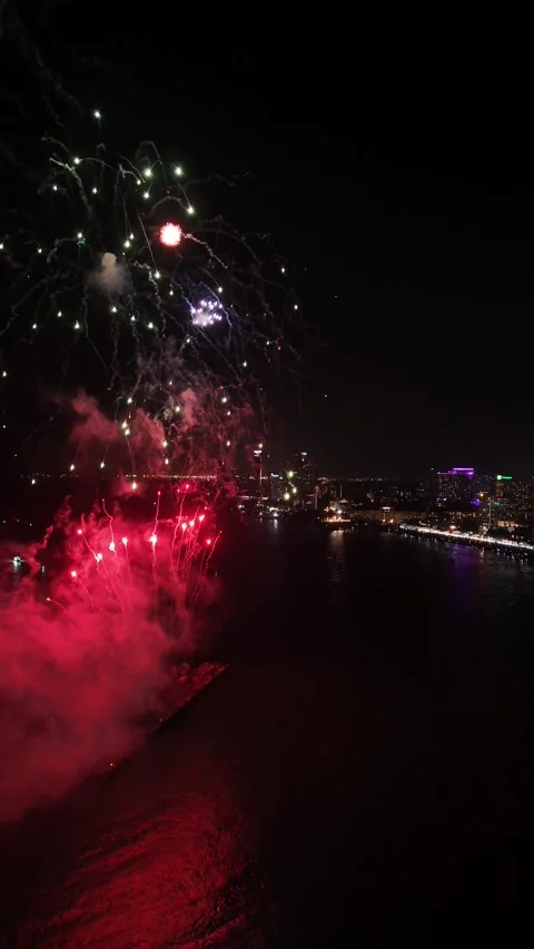 Spectacular Fireworks Exploding Over Pattaya, Thailand at Night Stock Footage 335844297