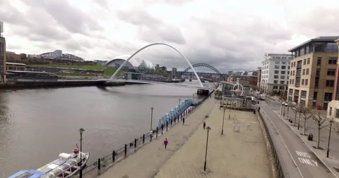 Spectacular Gateshead Millenium Bridge River Tyne starting with artwork Stock Footage 159137337