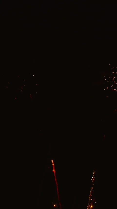 Spectacular golden fireworks exploding in the night sky Video stock 343160197