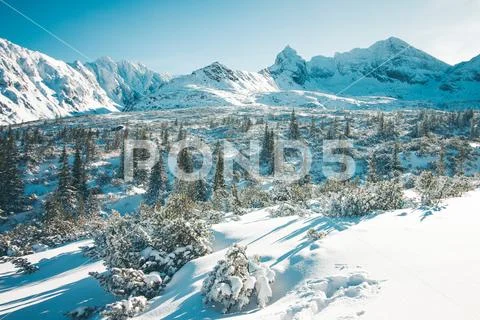 Spectacular landscape of snowy mountains in winter Stock Photos