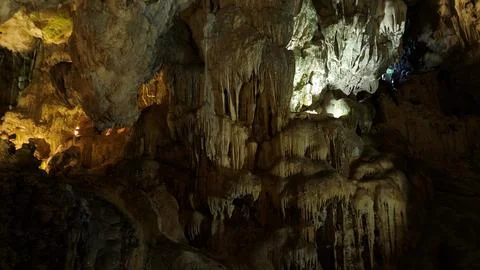 Spectacular limestone rock formations inside a cave in Ha Long Bay, Vietnam. Photos