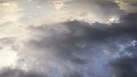 Spectacular movement of multi-colored clouds in the evening sky. Stock Footage 154610705