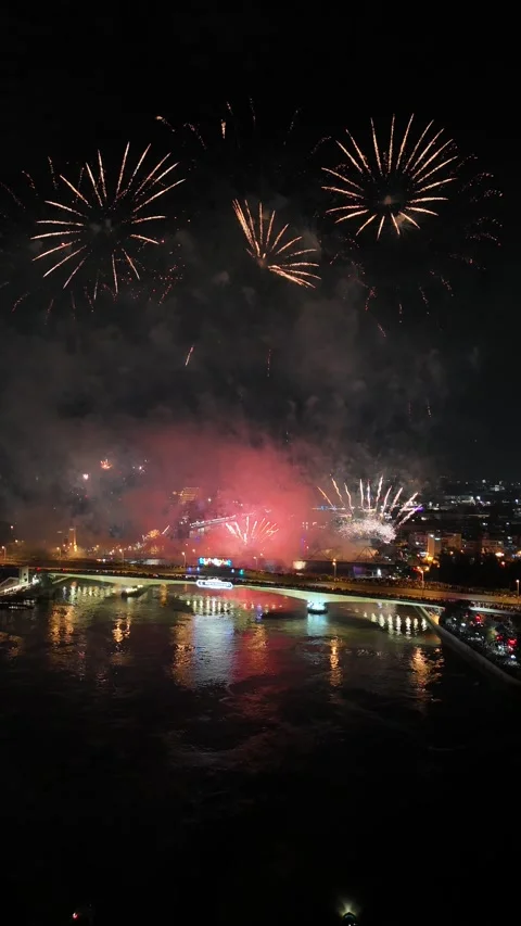 Spectacular New Year Fireworks Exploding Over a City Bridge in Bangkok, Thailand Stock Footage 335970153