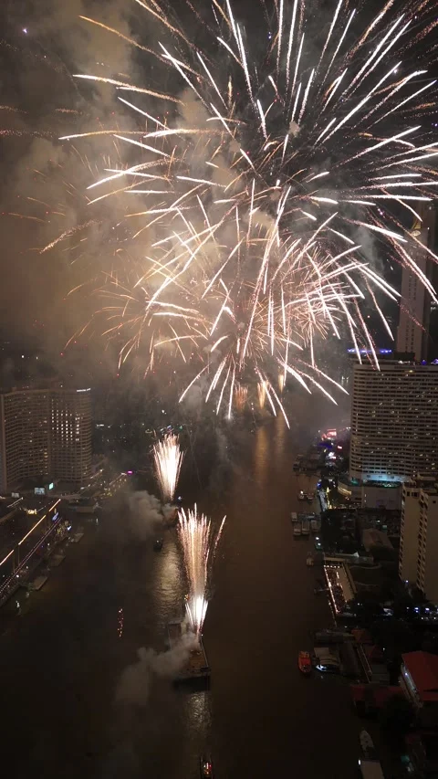 Spectacular New Year Fireworks Exploding Over River in Bangkok, Thailand Stock Footage 335974809