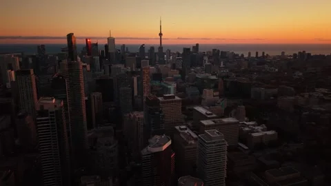 Spectacular purple peach panoramic evening drone view of modern Downtown Stock Footage 320528958