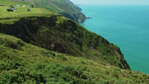 Spectacular rugged coastline from the coast path near Haddons Mouth, Devon,.. Stock Footage 336492135