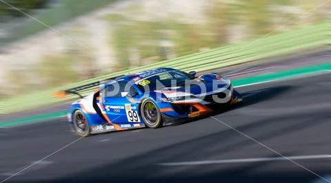 Spectacular scenic racing car on asphalt racetrack Honda NSX blurred ...