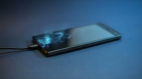 Spectacular сharging smartphone using a USB cable. Stock Footage 62855765