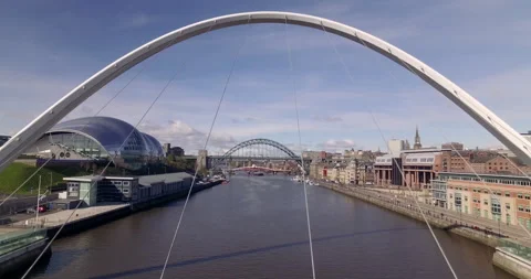 Spectacular shot of Gateshead Millenium Bridge starting between cables of arch Stock Footage 159149138