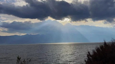Spectacular Sun Rays Over Erhai Lake with Mountains, Dali, Yunnan, China Stock Footage 337345668