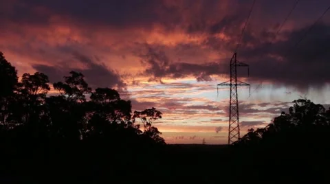 Spectacular sunset behind powerlines Stock Footage 61589885