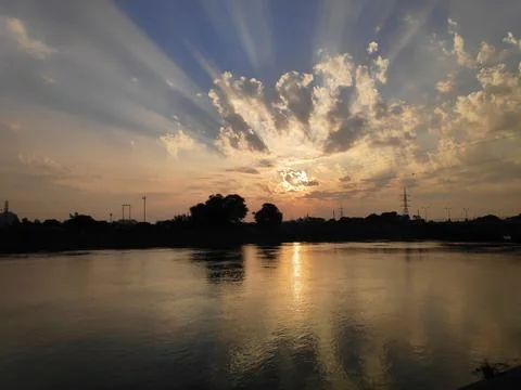 Spectacular Sunset Ray's above River Stock Photos