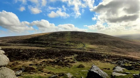 Spectacular video of timelapse clouds passing over Grimspound, Dartmoor Stock Footage 171022773