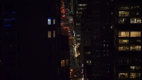 Spectacular view of night time traffic moving through the streets of New York Stock Footage 107749476