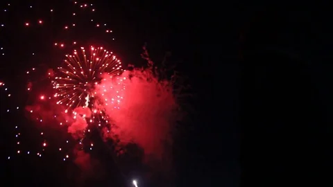 Spectacular view of a person watching fireworks Stock Footage 80800480