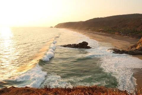 Spectacular view from the view point Punta Cometa, a big wave is rolling to.. Foto stock