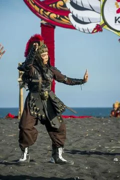 Spectacular warrior dance performance on Watu Pecak's black sand beach Stock Photos