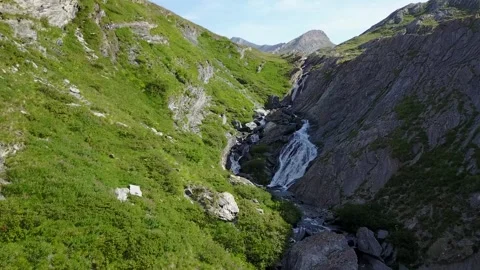 A spectacular waterfall cascading down from the mountainside, Ubaye, France Stock Footage 301402262