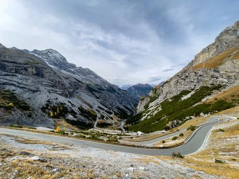 Spectacular Winding Road Through Dramatic Alpine Pass Stock Photos