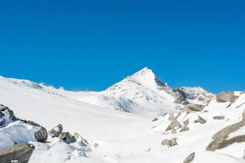 Spectacular winter mountain panorama high in austrian alps. Stock Photos
