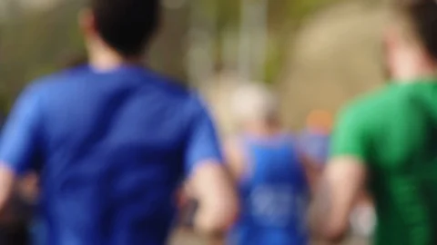 Spectator claps and gives five to half marathon participants Stock Footage 125866601