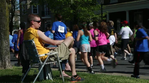 Spectators and 10K marathon runners  EDITORIAL USE ONLY Stock Footage 22656459