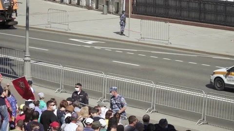 Spectators are waiting for the parade Stock Footage 133496423