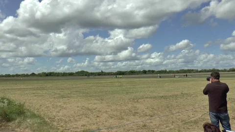 Spectators with Cameras at an Airshow Video stock 75829437