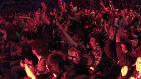 Spectators celebrating a videogames competition at a stadium full of people Stock Footage 157826486