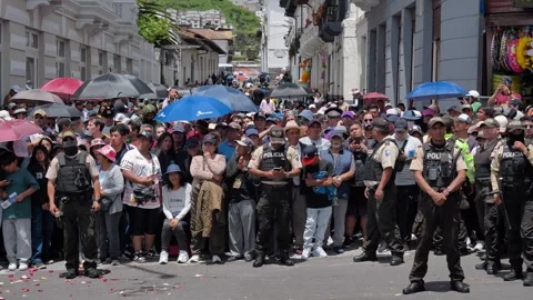 Spectators crowd watching the Jesus del Gran Poder procession in Quito during Stock Footage 333485195