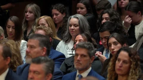 Spectators in the hearing room Stock Footage 345284091