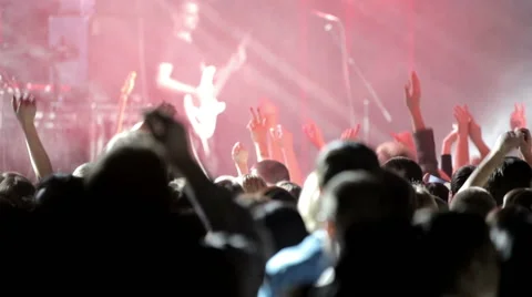 Spectators look at the performance of the group Stock Footage 48872831