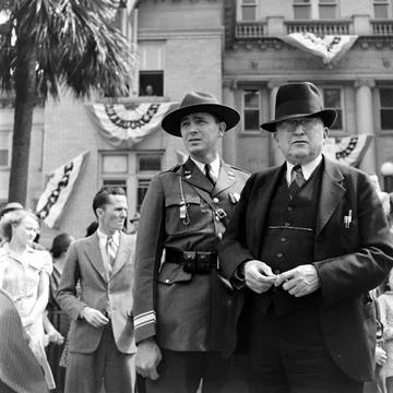 Spectators At A Parade Photos