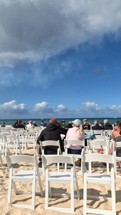Spectators Seated in White Chairs on Surfers Paradise Beach Vídeo Stock 344948629
