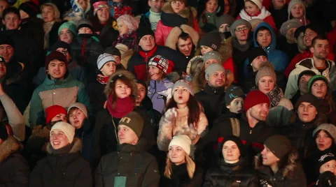 Spectators at the stadium during performances of athletes in winter. Stock Footage 45864782
