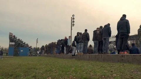 Spectators Standing by the Racetrack Video stock 83100834