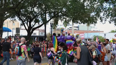 Spectators Surround a Parade Float at Jacksonville Pride, Florida Stock Footage 346920068