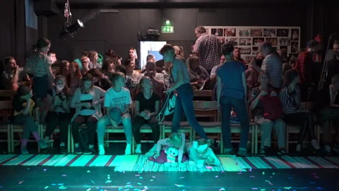 Spectators take their places before the performance in the small auditorium of Stock Footage 95812885