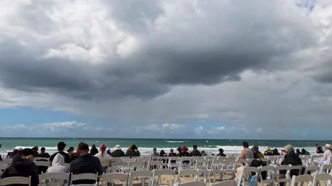 Spectators Watching Coastal Event from Beach Seating in Surfers Paradise 库存影片 344948475