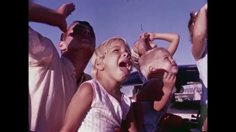 Spectators watching John Glenn spacecraft launch Stock Footage 262065119
