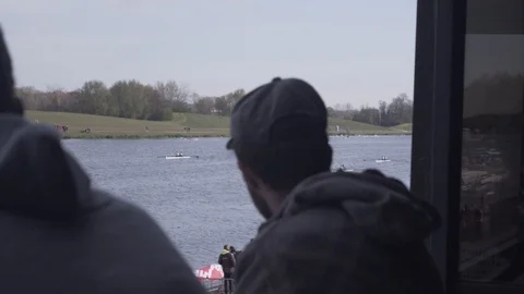Spectators watching Rowing Cinematic 60fps HD Stock Footage 128043166