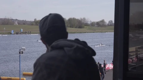 Spectators watching Rowing Cinematic Slow Motion HD Stock Footage 128043183