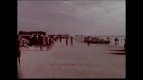 Spectators watching space rocket launch from beach location Stock Footage 263445445