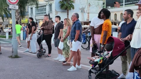 Spectators watching street performance on Nice promenade Video stock 336923168