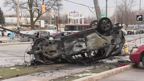 Spectaular car accident in city intersection with police and fire on scene Vídeos de archivo 146102103
