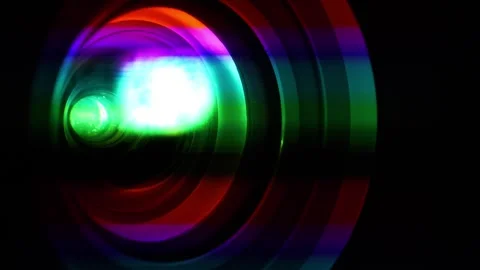 Spectral decomposition of light. Projector lens in operation,close-up shot video Stock Footage 285868383